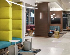 Lobby workspace at Tru By Hilton Denver Downtown Convention Center.