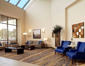 Lobby lounge at Embassy Suites By Hilton Los Angeles-Intl Airport North.