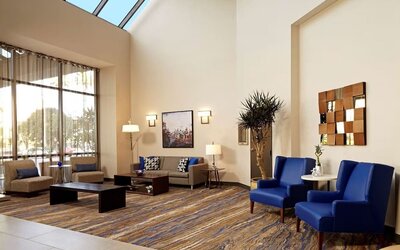 Lobby lounge at Embassy Suites By Hilton Los Angeles-Intl Airport North.