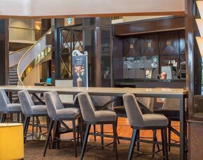 Lobby workspace and coffee shop at Hilton Newark Airport.