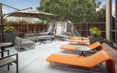 Lounge chairs at Crowne Plaza Dallas Market Ctr - Love Field.