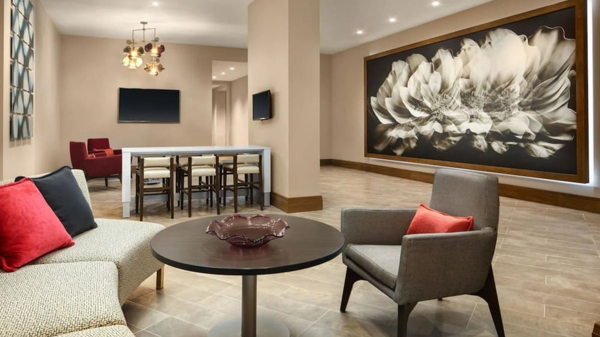 Lounge area and coworking space at Crowne Plaza Dallas Market Ctr - Love Field.