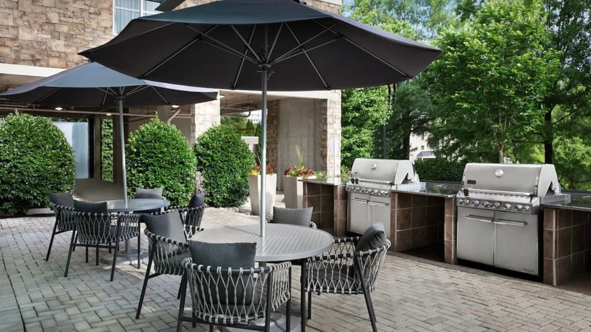 Barbecue grill and picnic area at TownePlace Suites Franklin Cool Springs.