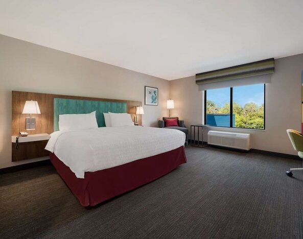 Spacious day use room with work desk at Hampton Inn Detroit Southfield.
