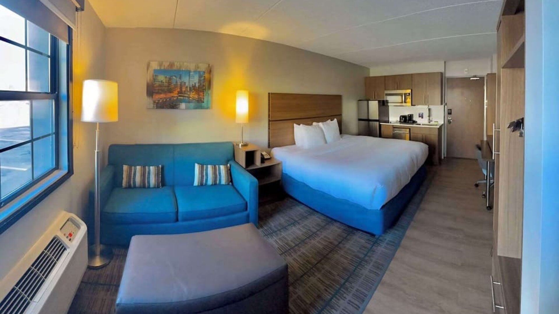 Day use room with workspace, in-room kitchen and living area at MainStay Suites Oak Brook Terrace - Chicago.