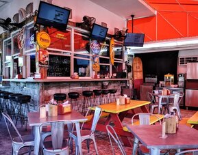 On-site bar and lounge area at Hollywood Beach Suites, A South Beach Group Hotel.