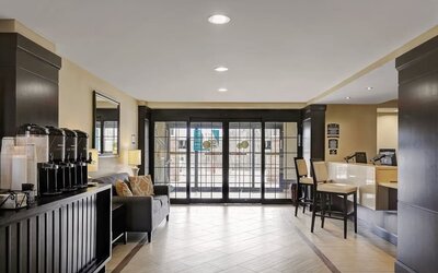 Lobby seating and coffee area at Staybridge Suites Washington D.C.- Greenbelt.