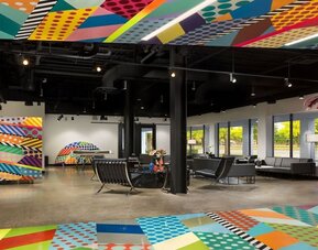 Lobby and coworking lounge at Hotel Studio Allston.