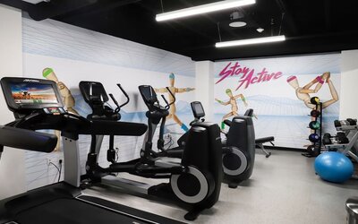 Fitness center available at Hotel Studio Allston.