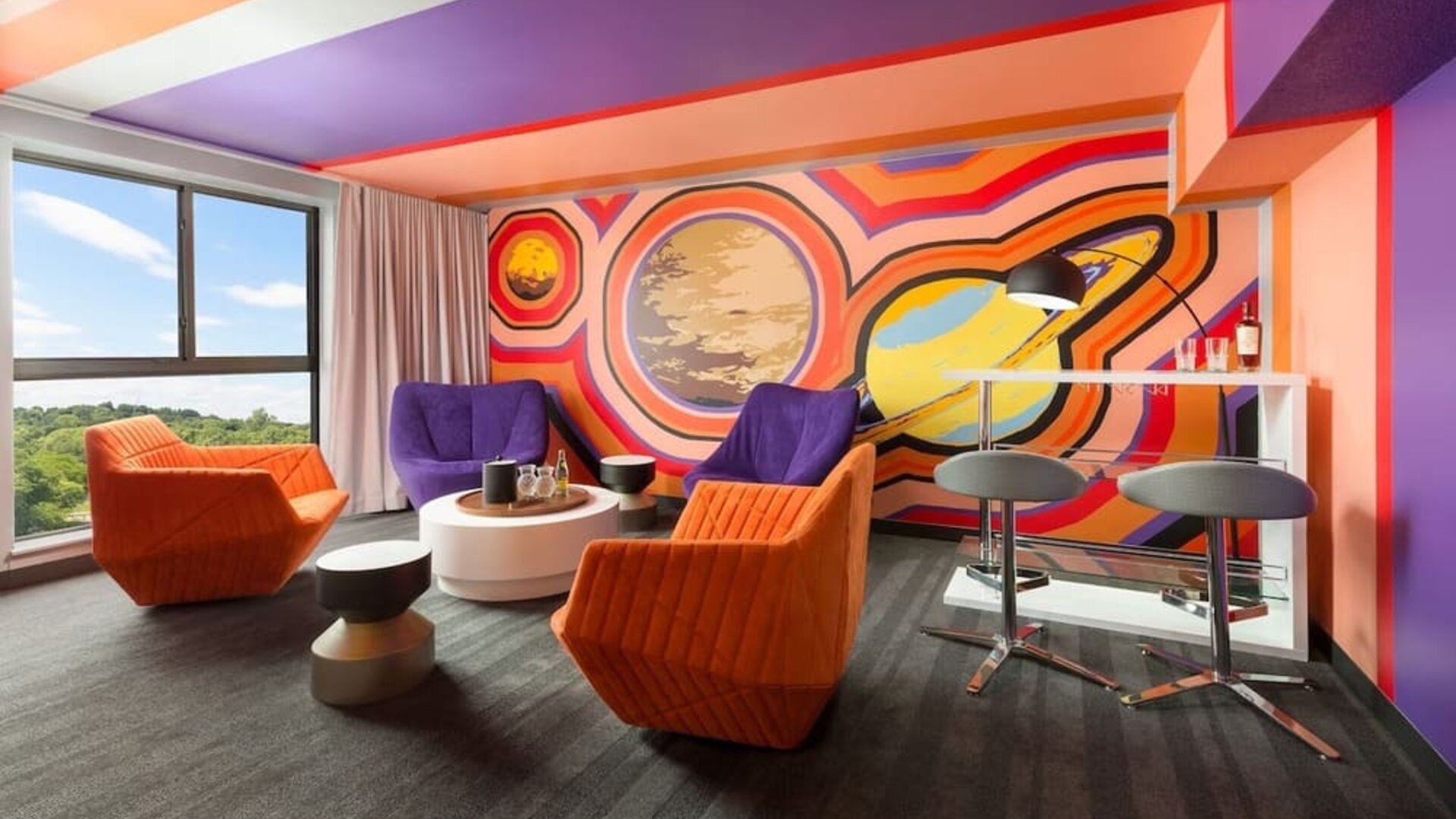 Bold design in the living room curated by talented artists at Hotel Studio Allston.
