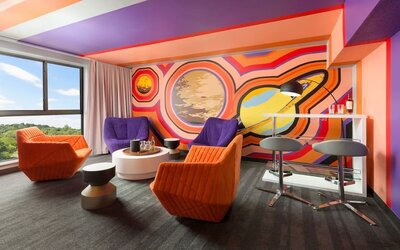 Bold design in the living room curated by talented artists at Hotel Studio Allston.