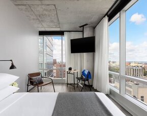 Day use room with a view of the city at Moxy Boston Downtown.