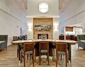 Lobby lounge and workspace at Homewood Suites By Hilton Newark-Cranford.