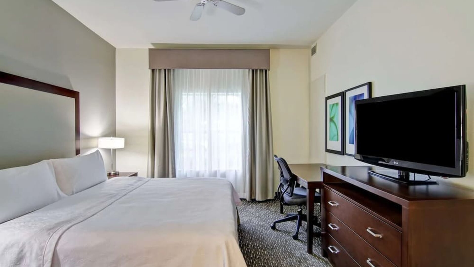 Bright day use room with work desk at Homewood Suites By Hilton Newark-Cranford.