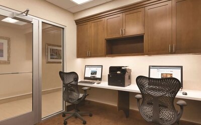 Dedicated business center with PC and printer at Hilton Garden Inn Boston Logan Airport.
