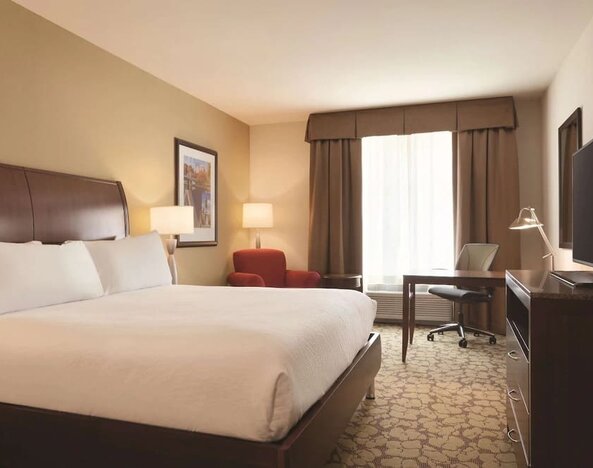 Day use room with work desk at Hilton Garden Inn Boston Logan Airport.