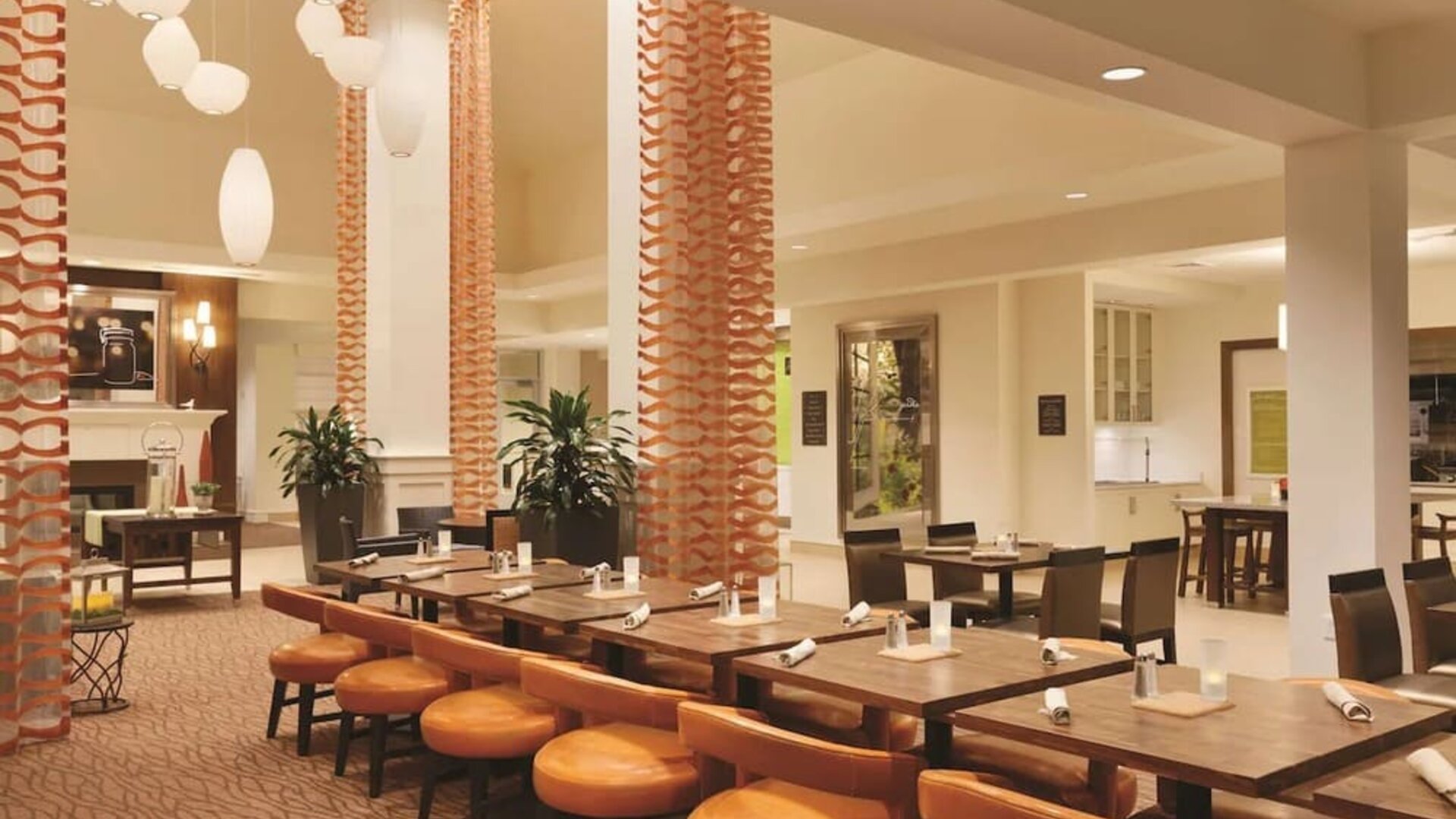 Dining area perfect for coworking at Hilton Garden Inn Boston Logan Airport.