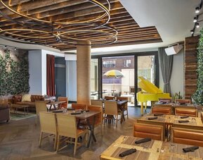 Dining area perfect for coworking at Royalton Park Avenue.