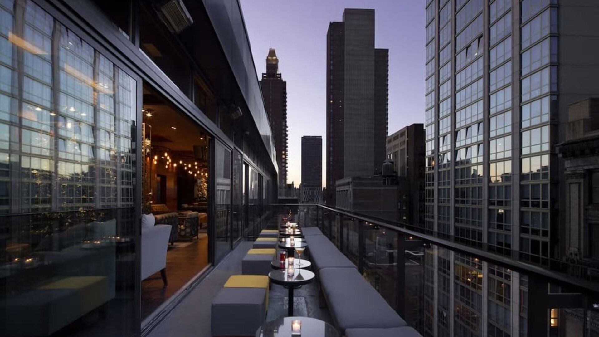 Hotel bar with balcony at Royalton Park Avenue.