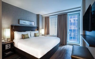 Day use room with balcony at The Bernic Hotel New York City, Tapestry Collection By Hilton.