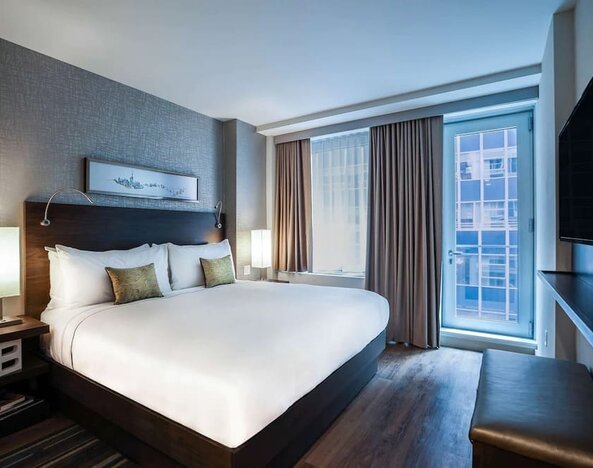 Day use room with balcony at The Bernic Hotel New York City, Tapestry Collection By Hilton.