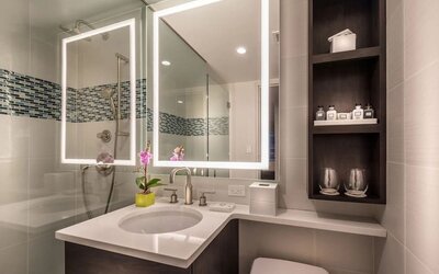 Guest bathroom with shower at The Bernic Hotel New York City, Tapestry Collection By Hilton.