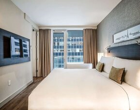 Day use room with balcony at The Bernic Hotel New York City, Tapestry Collection By Hilton.