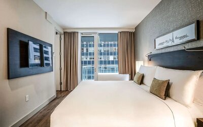 Day use room with balcony at The Bernic Hotel New York City, Tapestry Collection By Hilton.