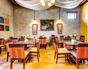 Dining area perfect for coworking at Comfort Inn Pomona Near Fairplex.