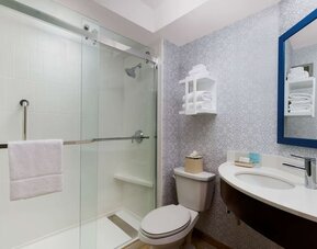 Guest bathroom with shower at Hampton Inn Ft. Lauderdale-Cypress Creek.