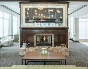 Lobby lounge area with fireplace at Hilton Garden Inn Dothan.