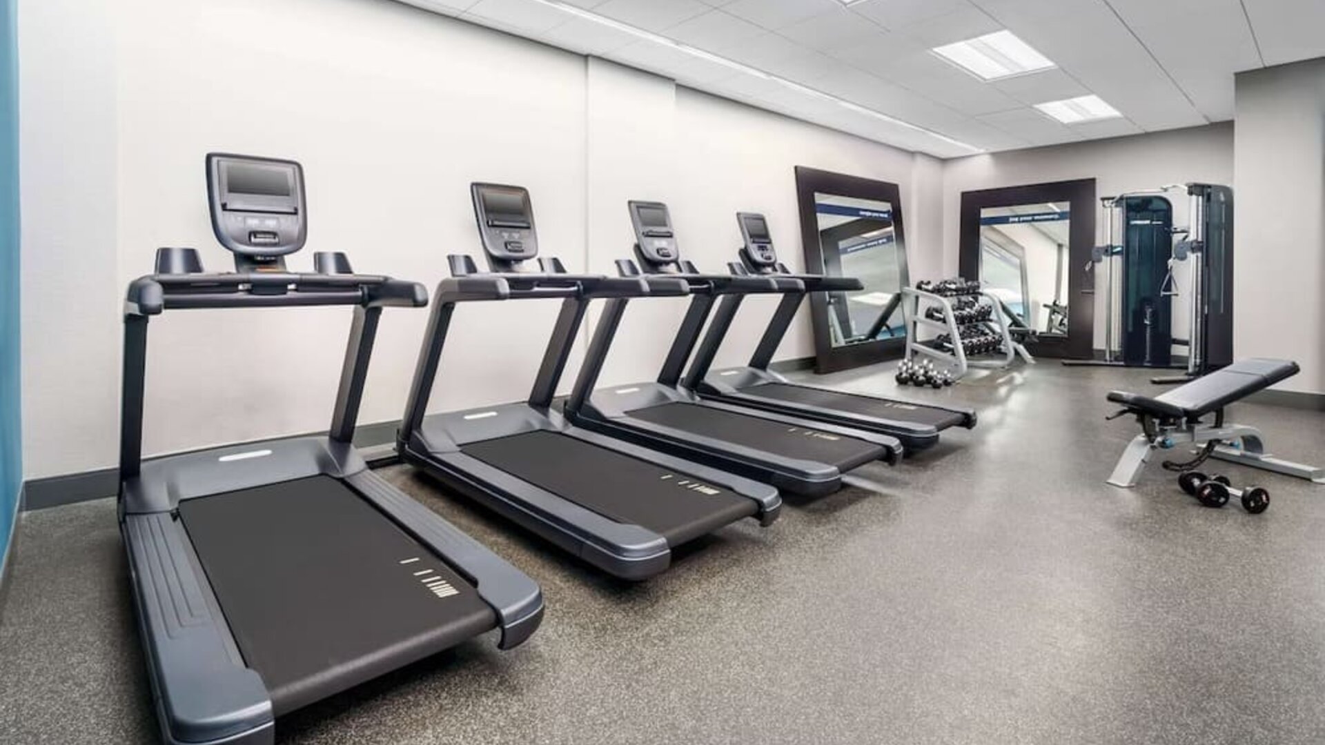 Fully equipped fitness center at Hampton Inn Manhattan/Times Square Central.