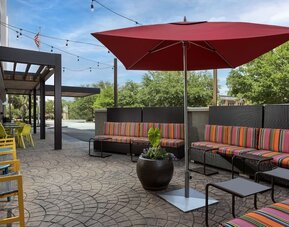Outdoor lounge seating at Home2 Suites By Hilton Charleston Airport/Convention Center.