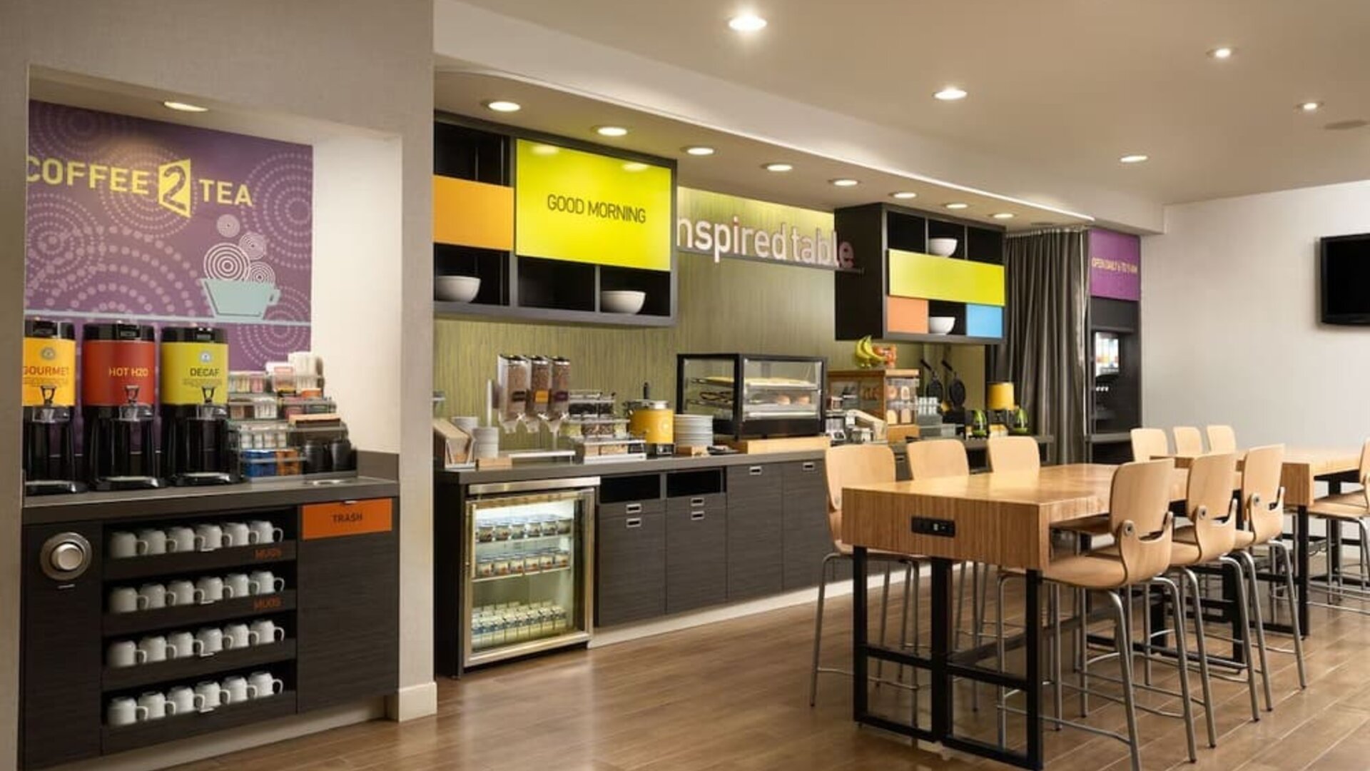 Dining area perfect for coworking at Home2 Suites By Hilton Charleston Airport/Convention Center.