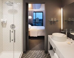 Private guest bathroom with shower at Le Méridien Columbus, The Joseph.