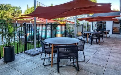 Hotel terrace with lounge seating at Hampton Inn Vallejo.