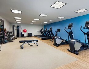 Fitness center at Embassy Suites By Hilton West Palm Beach Central.