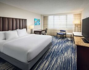 Day use room with work desk at Embassy Suites By Hilton West Palm Beach Central.