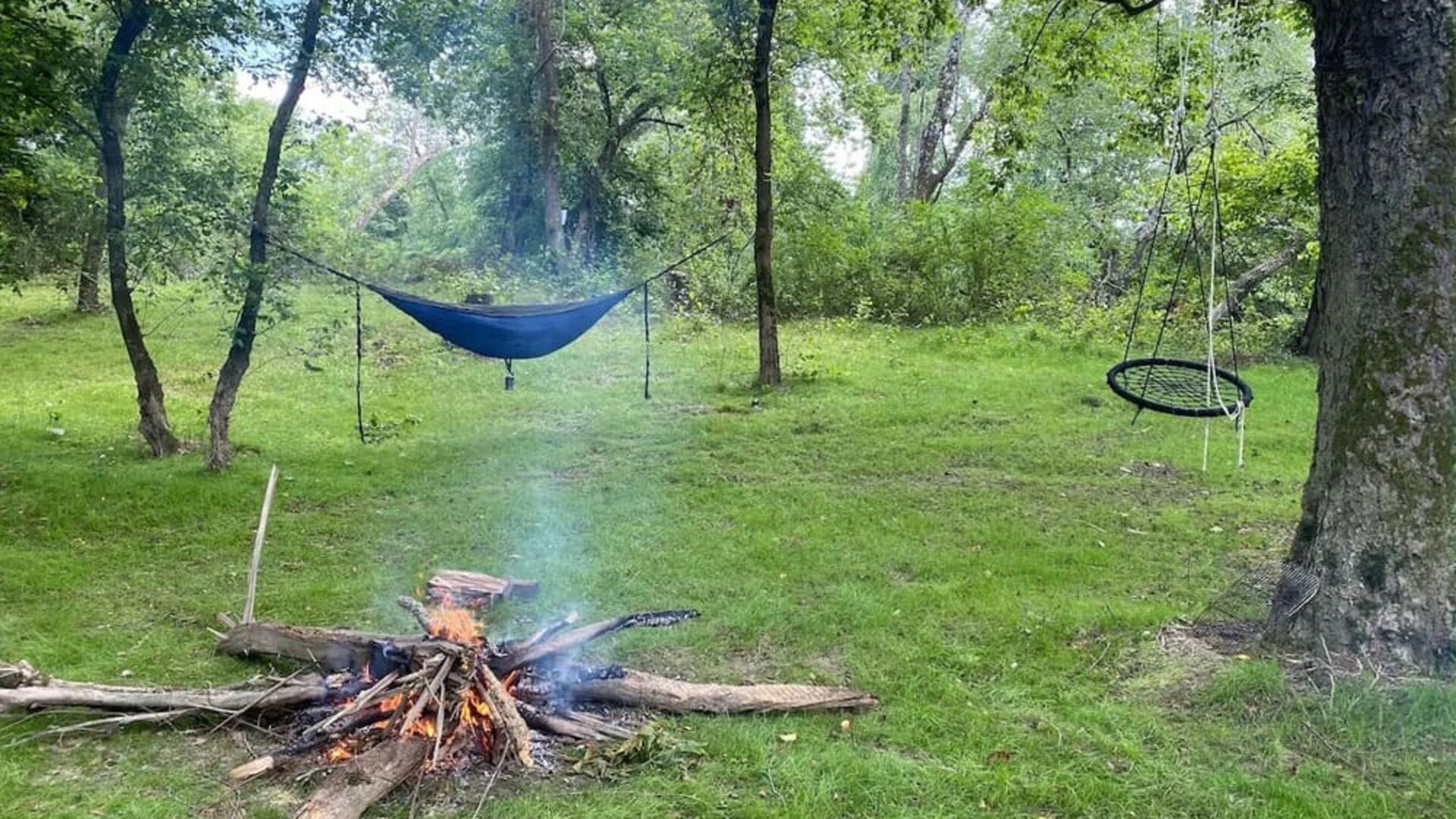 Courtyard with fireplace and lounge area at SKYLARANNA Resort & Spa.
