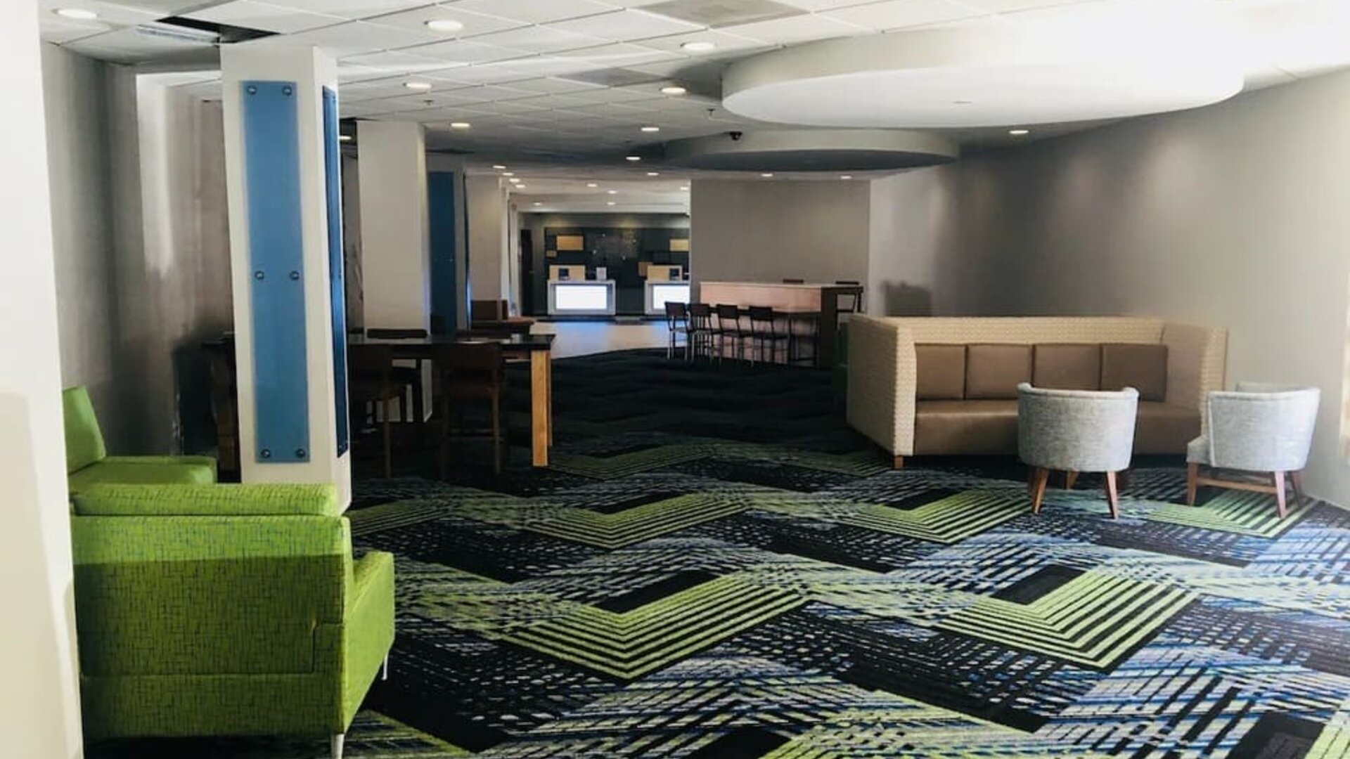 Lobby lounge area at Holiday Inn Express Towson Baltimore North.