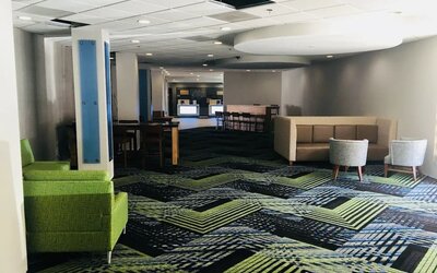 Lobby lounge area at Holiday Inn Express Towson Baltimore North.