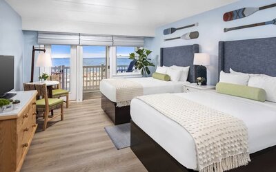 Day use twin room with workspace and balcony at Sea Crest Beach Hotel.