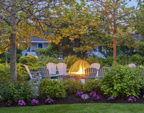 Outdoor lounge seating at Sea Crest Beach Hotel.