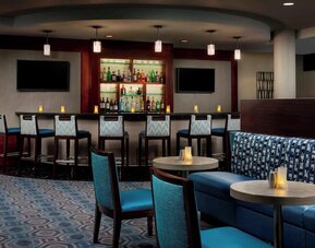 On-site bar with lounge area at Courtyard Boston Cambridge.