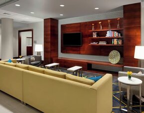 Lobby lounge with comfortable seating, perfect for coworking at Courtyard Boston Cambridge.