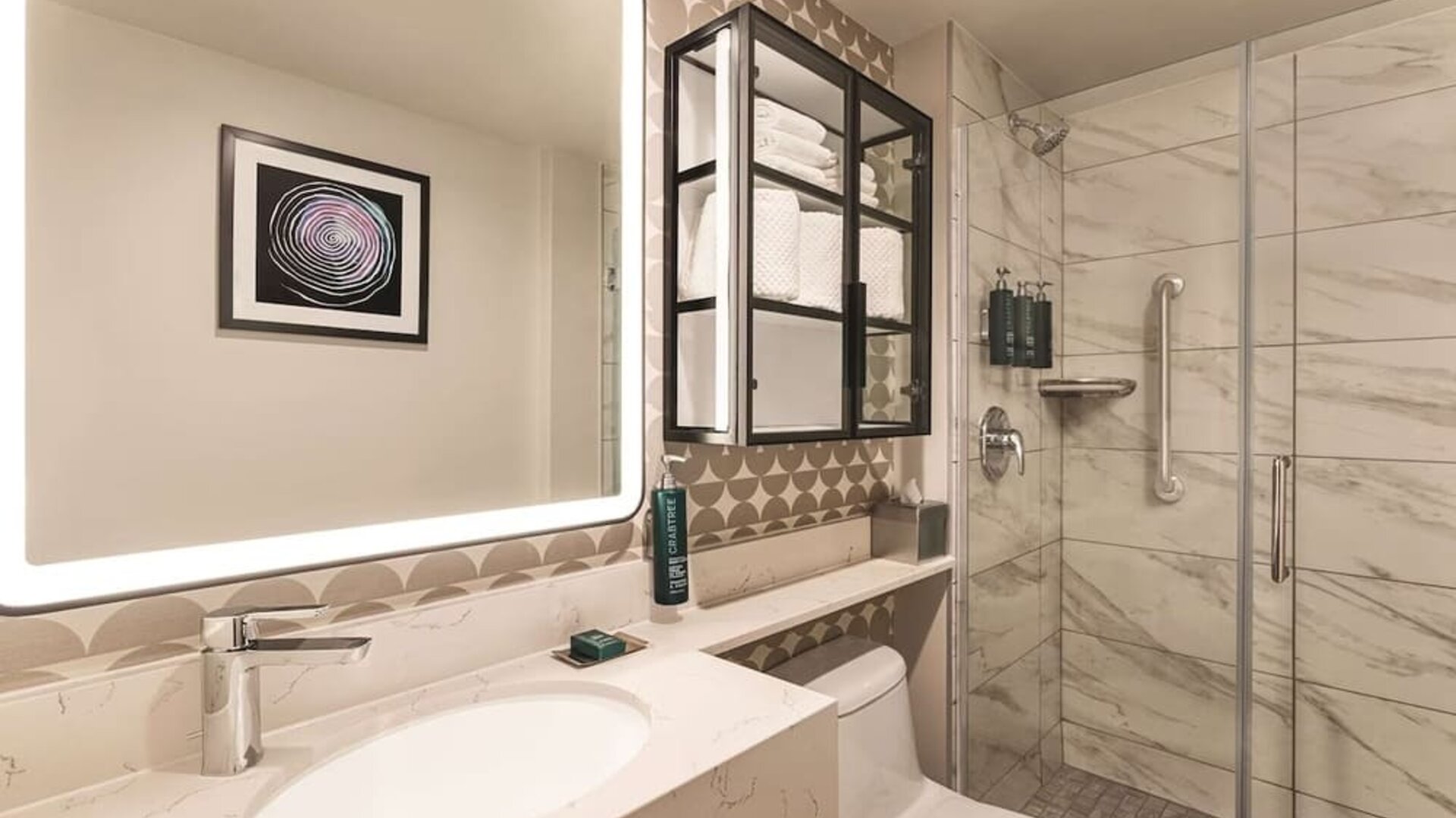 Private guest bathroom with shower and free toiletries at DoubleTree By Hilton New York Midtown Fifth Ave.