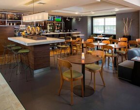 On-site restaurant and dining area at Sonesta Select Atlanta Norcross I-85.