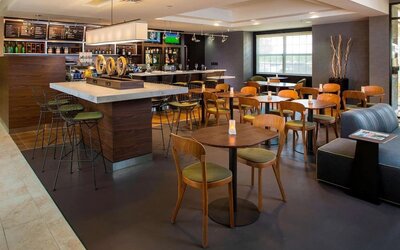 On-site restaurant and dining area at Sonesta Select Atlanta Norcross I-85.