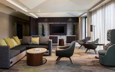 Lobby lounge area with comfortable seating at Sonesta Select Atlanta Norcross I-85.