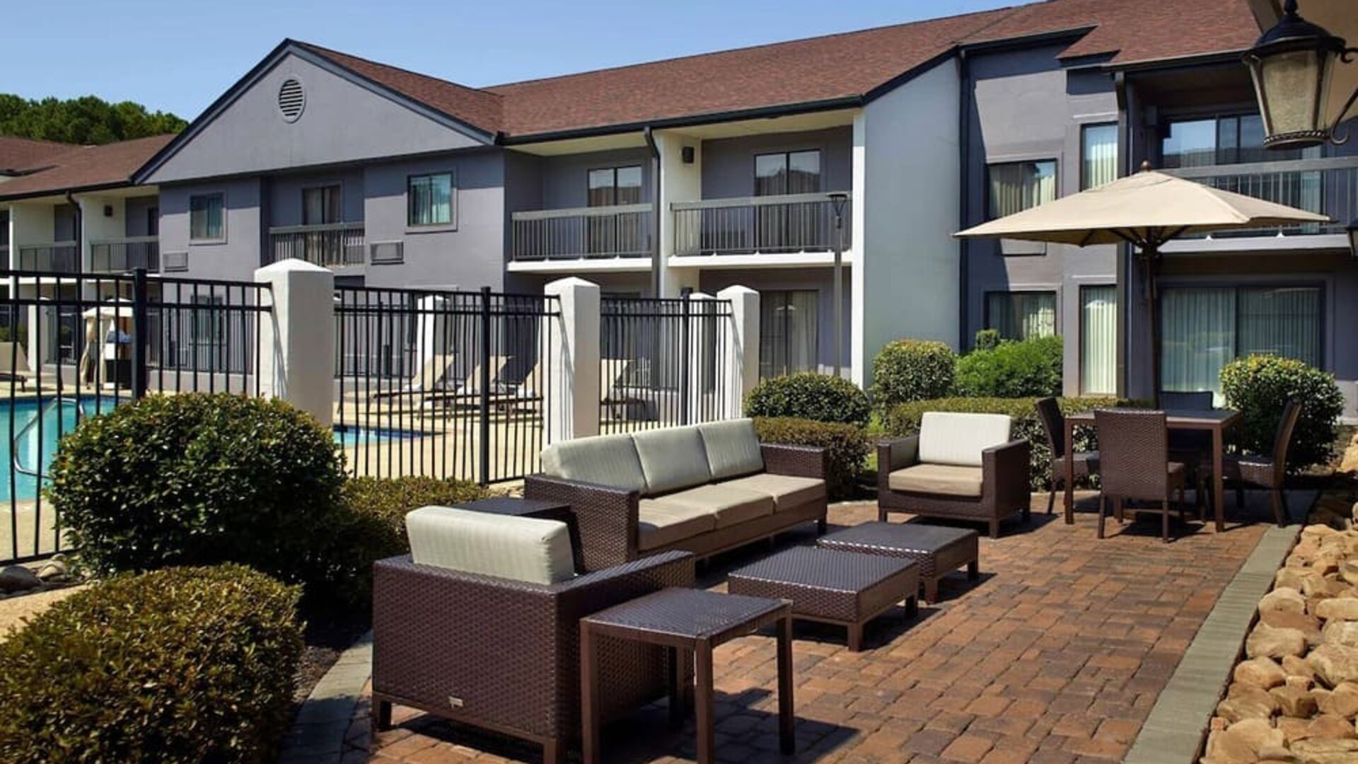 Hotel patio with lounge seating at Sonesta Select Atlanta Norcross I-85.